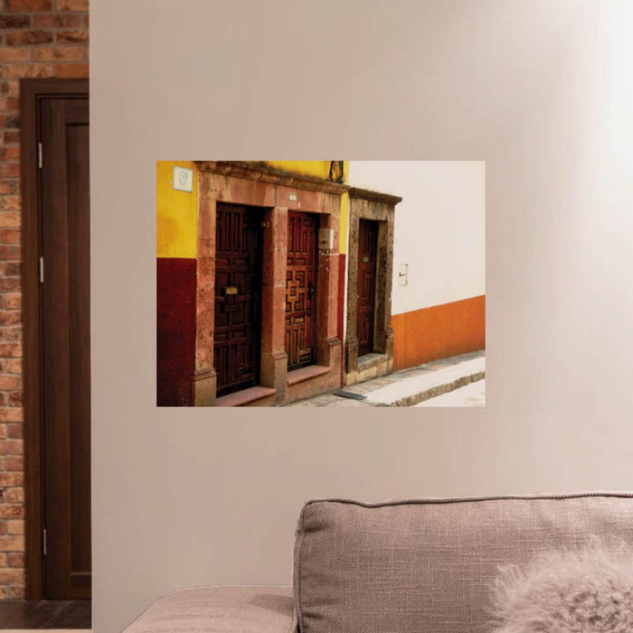 24 inch Mexican Multi-Entrance Architecture decal displayed on wall above couch