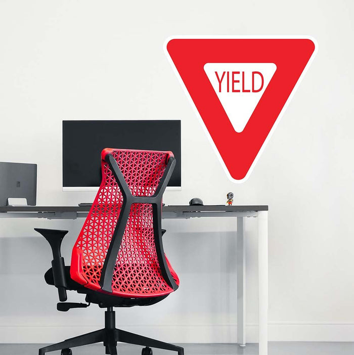24 inch Yield Sign Wall Decal Installed Above Desk