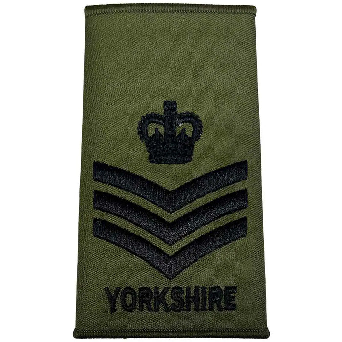 Yorkshire Regiment Rank Slide Olive Green with three chevrons and a crown above 'YORKSHIRE', denoting a staff sergeant rank. Staff Sergeant from  John Bull Clothing
